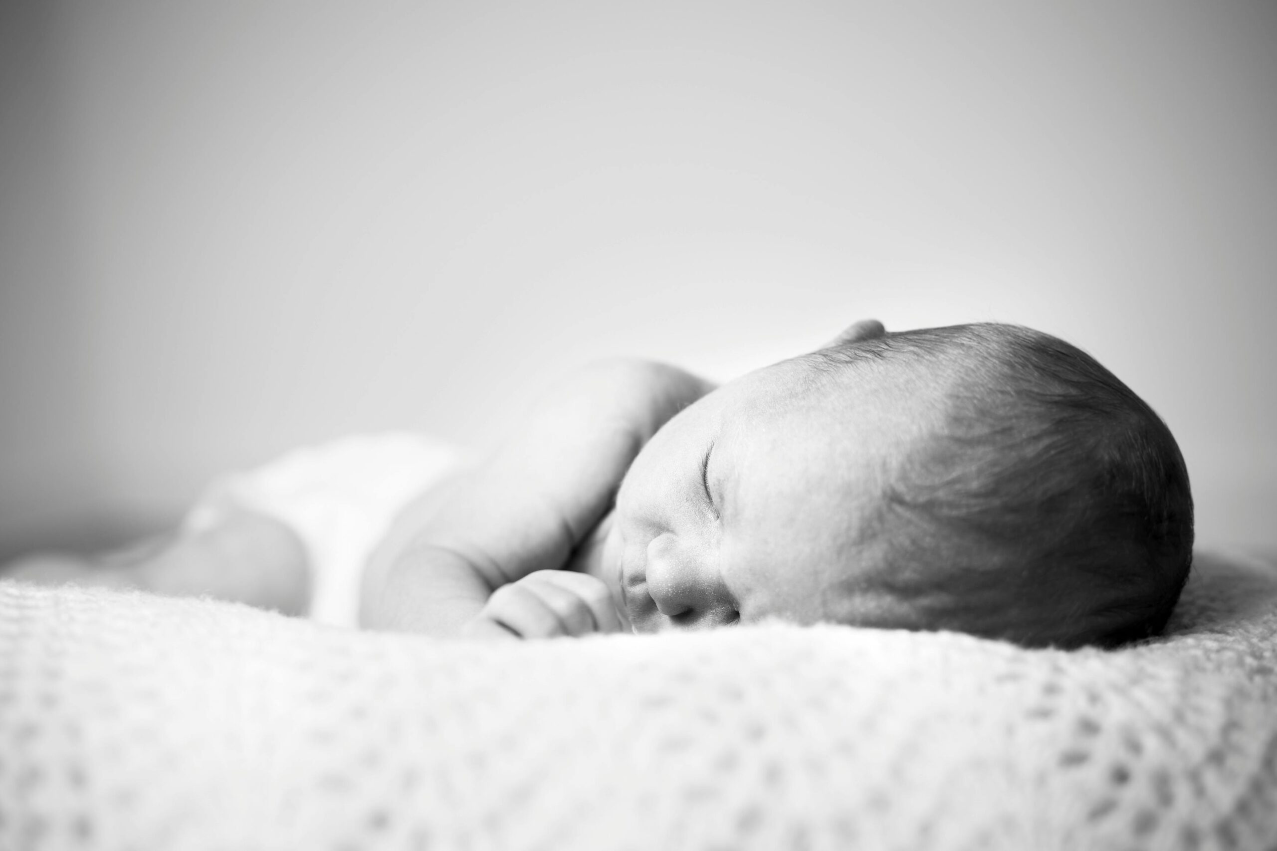 Photo by Rene Terp: https://www.pexels.com/photo/grayscale-photo-of-baby-sleeping-2505101/